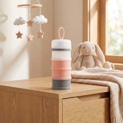 boîte doseuse de lait rose