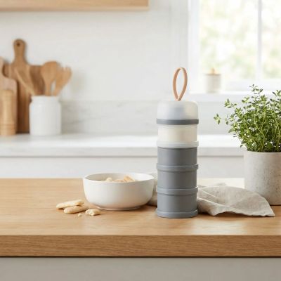 boîte doseuse de lait grise