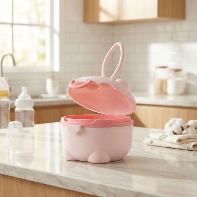 Boite doseuse de lait rose