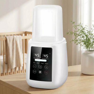 Chauffe biberon blanc sur table