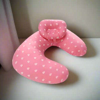 Coussin d'allaitement rose avec petits coeurs blanc
