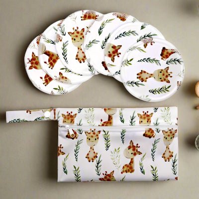 coussinets d'allaitement fond blanc avec girafes