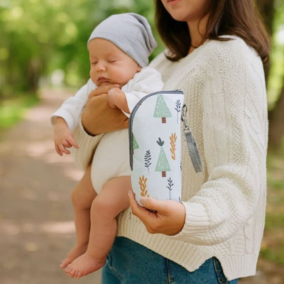 Porte biberon bébé bras maman