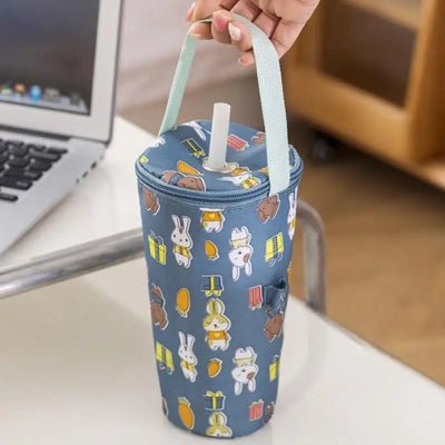 sac biberon isotherme bleu sur table